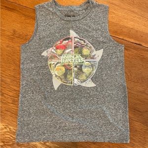 Bundle of two boys sleeveless T’s. Size 6-7. Gray Ninja Turtles + solid blue.